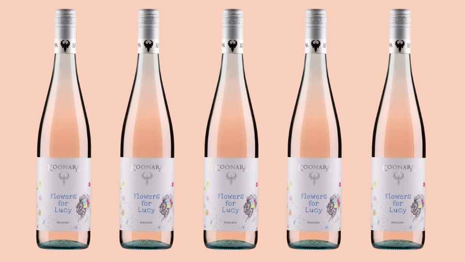 Pink Background with five bottles of Flowers for Lucy Moscato Wine