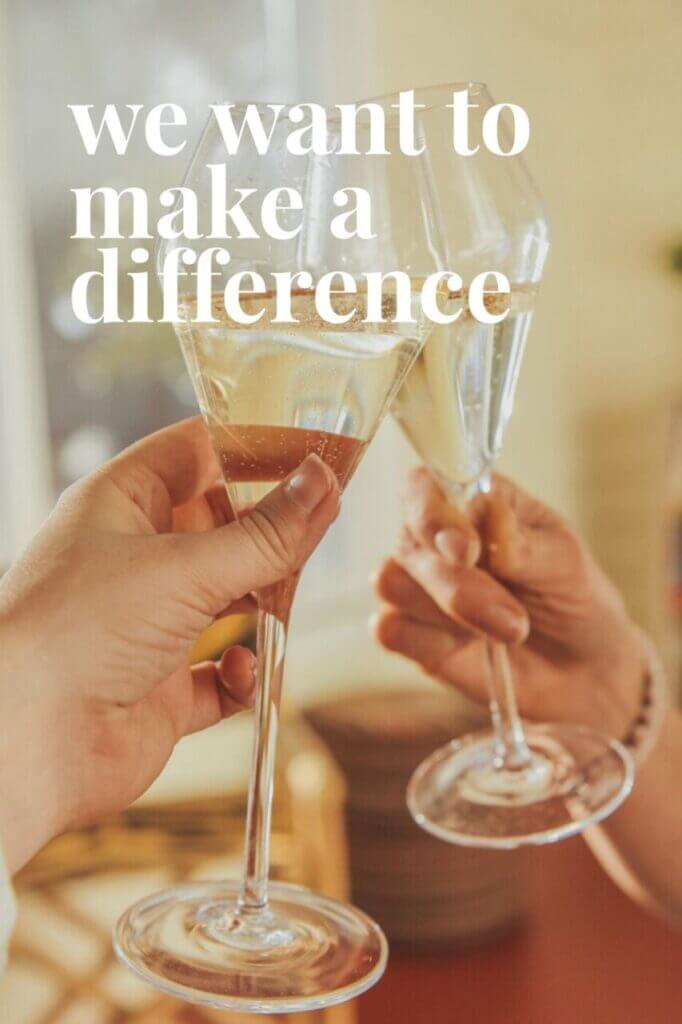 Hands toasting with wine glasses showcasing Koonara family winery's commitment to making a difference through organic Coonawarra vegan-friendly low sulphur Australian wine