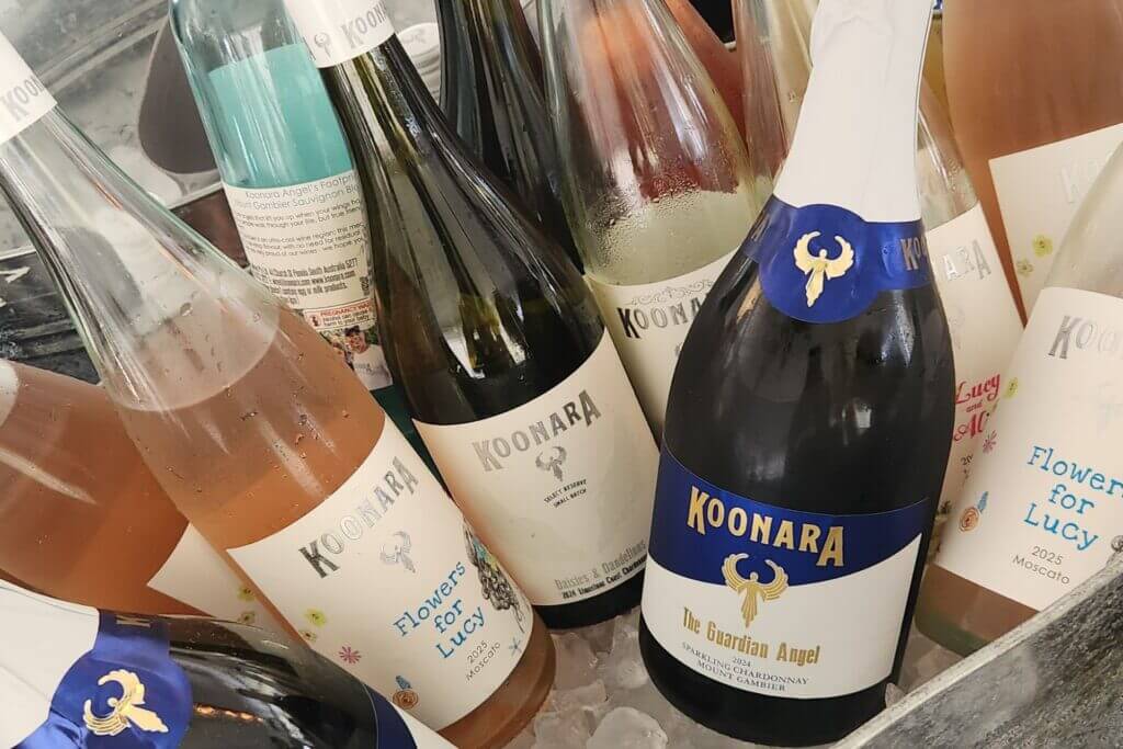 Chilled selection of Koonara wines on ice including The Guardian Angel Sparkling Chardonnay, Flowers for Lucy Moscato, Daisies and Dandelions Chardonnay, and Angel's Footprint Sauvignon Blanc from South Australia